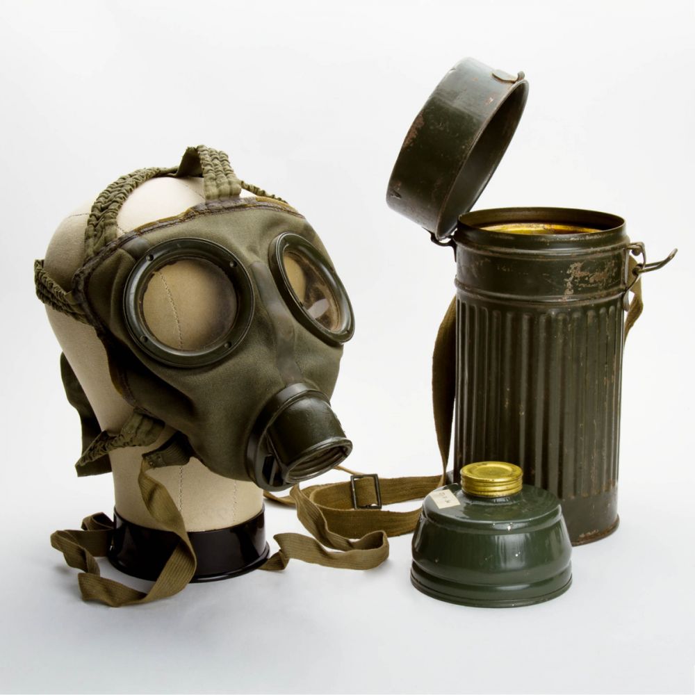 German WWII Gas Mask (1934) with 10" x 4" Container - Rare Collectibles TV